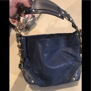 Authentic Coach purse with gold detailing